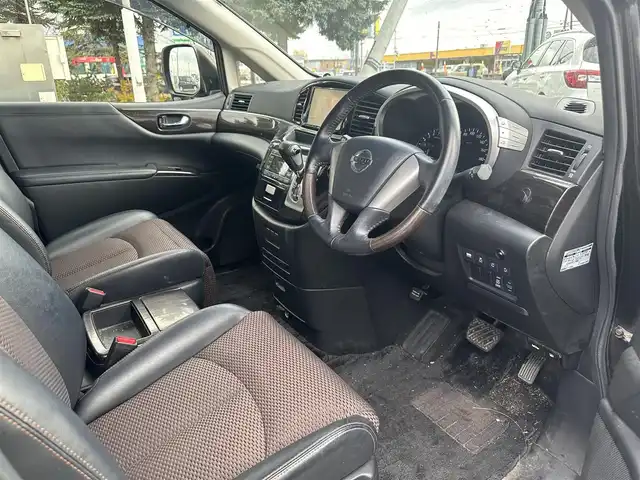 日産 エルグランド 250HWS アーバンクロム 道北・旭川 2013(平25)年 12.6万km ファントムブラック (株)IDOMが運営する【じしゃロン旭川店】の自社ローン専用車両になります。こちらは現金またはオートローンご利用時の価格です。自社ローンご希望の方は別途その旨お申付け下さい/　/・社外ナビ(CD/DVD/BT/HDD/SD/フルセグ)/・バックカメラ/・ETC/・ドライブレコーダー/・両側パワースライドドア/・フリップダウンモニター/・電動格納ウィンカーミラー/・プッシュスタート/・スマートキー1個/・フォグランプ/・積込スタッドレスタイヤ/・取扱説明書