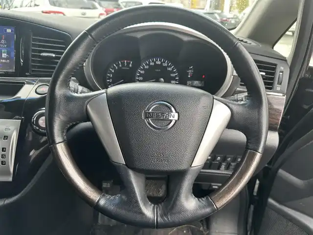 日産 エルグランド 250HWS アーバンクロム 道北・旭川 2013(平25)年 12.6万km ファントムブラック (株)IDOMが運営する【じしゃロン旭川店】の自社ローン専用車両になります。こちらは現金またはオートローンご利用時の価格です。自社ローンご希望の方は別途その旨お申付け下さい/　/・社外ナビ(CD/DVD/BT/HDD/SD/フルセグ)/・バックカメラ/・ETC/・ドライブレコーダー/・両側パワースライドドア/・フリップダウンモニター/・電動格納ウィンカーミラー/・プッシュスタート/・スマートキー1個/・フォグランプ/・積込スタッドレスタイヤ/・取扱説明書