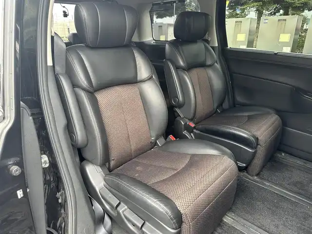 日産 エルグランド 250HWS アーバンクロム 道北・旭川 2013(平25)年 12.6万km ファントムブラック (株)IDOMが運営する【じしゃロン旭川店】の自社ローン専用車両になります。こちらは現金またはオートローンご利用時の価格です。自社ローンご希望の方は別途その旨お申付け下さい/　/・社外ナビ(CD/DVD/BT/HDD/SD/フルセグ)/・バックカメラ/・ETC/・ドライブレコーダー/・両側パワースライドドア/・フリップダウンモニター/・電動格納ウィンカーミラー/・プッシュスタート/・スマートキー1個/・フォグランプ/・積込スタッドレスタイヤ/・取扱説明書