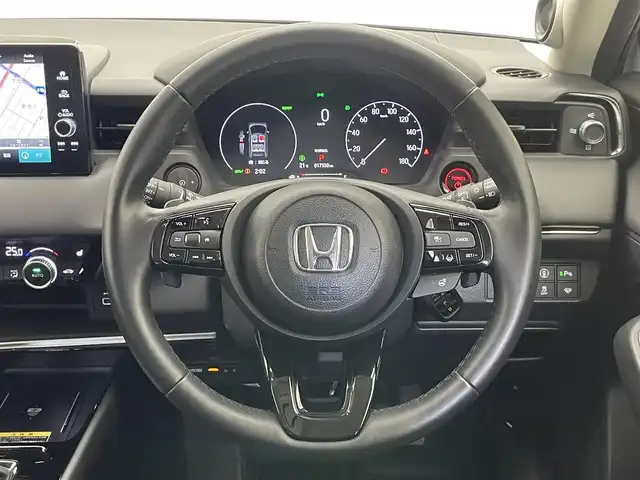 ホンダ ヴェゼル ハイブリッド e:HEV Z 愛知県 2023(令5)年 1.8万km プレミアムサンライトホワイトパール 純正９型ナビＴＶ　全方位カメラ　禁煙車　ハーフレザー　シートヒーター　ワイヤレス充電　ホンダセンシング　衝突軽減　追従クルコン　ＢＳＭ　電動リアゲート　純正ドラレコ　ＥＴＣ２．０　ＬＥＤオートライト　車線逸脱　フォグランプ