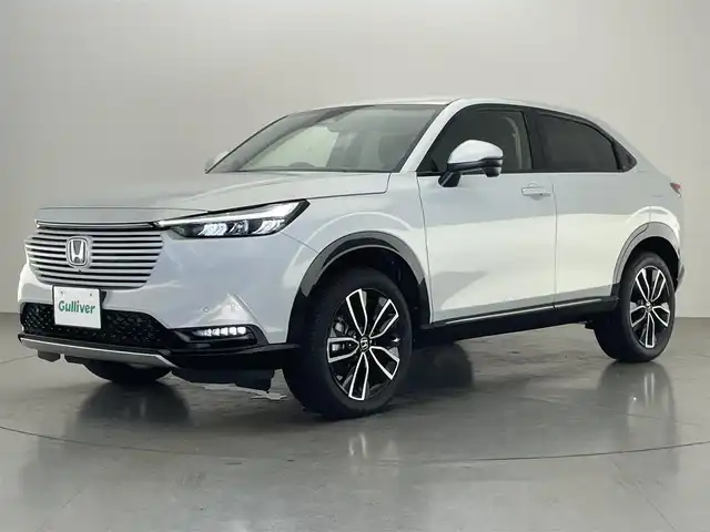 ホンダ ヴェゼル ハイブリッド e:HEV Z 愛知県 2023(令5)年 1.8万km プレミアムサンライトホワイトパール 純正９型ナビＴＶ　全方位カメラ　禁煙車　ハーフレザー　シートヒーター　ワイヤレス充電　ホンダセンシング　衝突軽減　追従クルコン　ＢＳＭ　電動リアゲート　純正ドラレコ　ＥＴＣ２．０　ＬＥＤオートライト　車線逸脱　フォグランプ