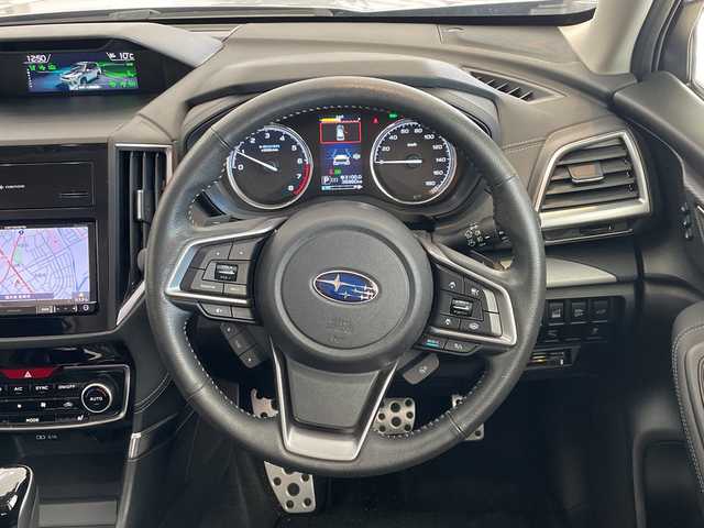 スバル フォレスター ハイブリッド アドバンス 福井県 2018(平30)年 3.9万km アイスシルバーメタリック ４WD/純正7インチメモリーナビ/フルセグTV/BT/DVD/CD/USB/SD/MSV/バックカメラ/フロント＆サイドビューモニター/アイサイト/・全車速追従機能付クルーズコントロール/・プリクラッシュブレーキ/・アクティブレーンキープ/・リバースオートマチックブレーキ/・クリアランスソナー/・ブラインドスポットモニター/ETC/デジタルインナーミラー/パワーバックドア/パワーシート/全席シートヒーター/ステアリングヒーター/ハーフレザーシート/パドルシフト/オートライト/LEDヘッドライト/純正18インチアルミホイール/MTモード付AT/プッシュスタート/スマートキー/ルーフレール