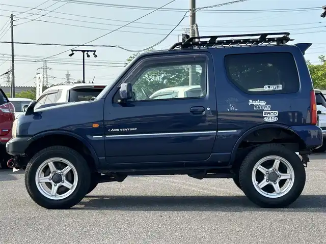 スズキ ジムニー ランドベンチャー 道央・札幌 2007(平19)年 10.4万km キャッツアイブルーメタリック ４WD/社外SDナビ/AM/FM/CD/DVD/ワンセグ/ハーフレザーシート/シートヒーター/ヘッドライトレベライザー/電格ミラー/社外LEDヘッドライト/リフトアップ/ミラーヒーター/リモコンキー