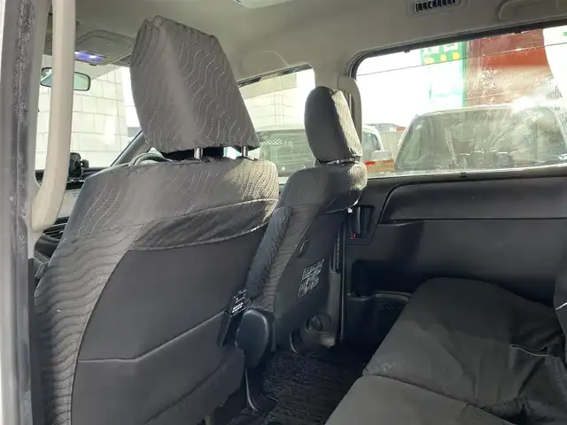 トヨタ ノア Si 岡山県 2014(平26)年 9.8万km ホワイトパールクリスタルシャイン 登録時走行距離97451km/フリップダウン後席モニター/純正SDナビ/(AM/FM/TV/DISC/BT)/アイドリングストップ/MTモード付AT/バックカメラ/ビルトインETC/ドライブレコーダー/両側パワースライドドア/プッシュスタート/スマートキー/純正16インチアルミホイール/キセノンヘッドライト/8人乗り