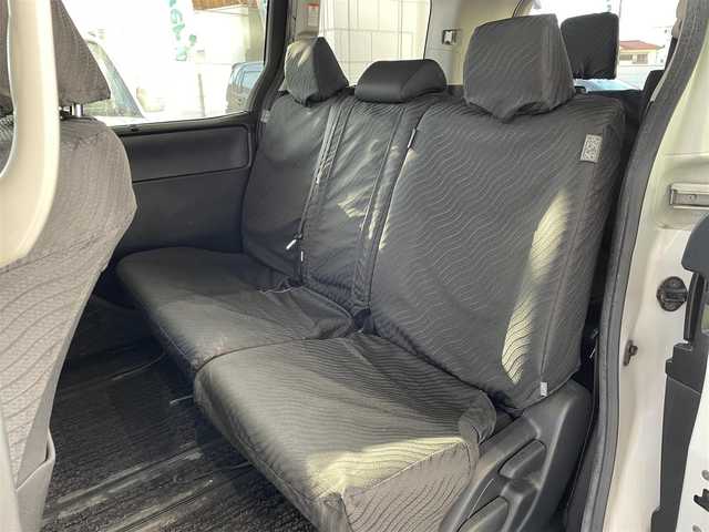 トヨタ ノア Si 岡山県 2014(平26)年 9.8万km ホワイトパールクリスタルシャイン 登録時走行距離97451km/フリップダウン後席モニター/純正SDナビ/(AM/FM/TV/DISC/BT)/アイドリングストップ/MTモード付AT/バックカメラ/ビルトインETC/ドライブレコーダー/両側パワースライドドア/プッシュスタート/スマートキー/純正16インチアルミホイール/キセノンヘッドライト/8人乗り