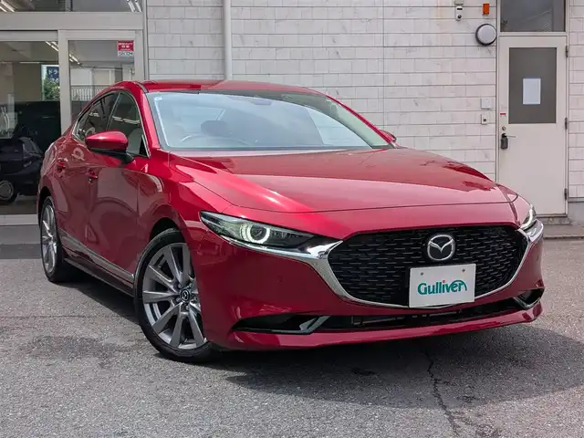 マツダ マツダ３セダン 20S Lパッケージ 埼玉県 2019(令1)年 1.1万km ソウルレッドクリスタルM ワンオーナー/純正ディスプレイオーディオ/追従機能つきクルーズコントロール/フルセグTV/Bluetoothオーディオ/CD/DVD再生/バックカメラ/ETC/ステアリングヒーター/シートヒーター（運転席/助手席）/プッシュスタート/LEDヘッドライト/スマートキー×2