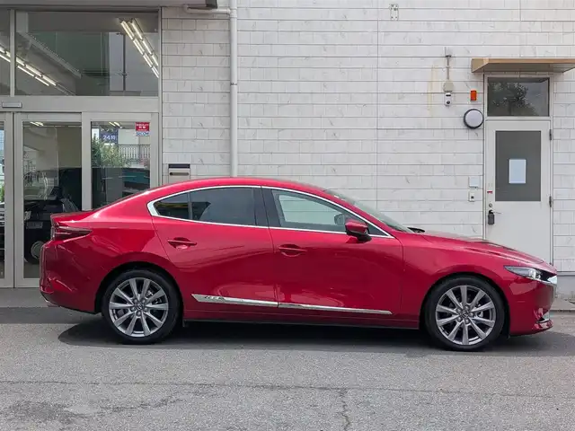 マツダ マツダ３セダン 20S Lパッケージ 埼玉県 2019(令1)年 1.1万km ソウルレッドクリスタルM ワンオーナー/純正ディスプレイオーディオ/追従機能つきクルーズコントロール/フルセグTV/Bluetoothオーディオ/CD/DVD再生/バックカメラ/ETC/ステアリングヒーター/シートヒーター（運転席/助手席）/プッシュスタート/LEDヘッドライト/スマートキー×2