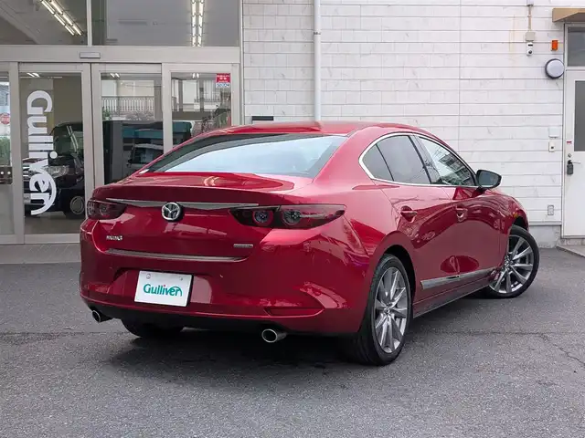 マツダ マツダ３セダン 20S Lパッケージ 埼玉県 2019(令1)年 1.1万km ソウルレッドクリスタルM ワンオーナー/純正ディスプレイオーディオ/追従機能つきクルーズコントロール/フルセグTV/Bluetoothオーディオ/CD/DVD再生/バックカメラ/ETC/ステアリングヒーター/シートヒーター（運転席/助手席）/プッシュスタート/LEDヘッドライト/スマートキー×2