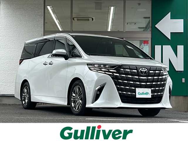 トヨタ アルファードハイブリット Z 愛知県 2024(令6)年 1.4万km プラチナホワイトパールマイカ 禁煙車/法人ワンオーナー/純正メーカーナビ、TV/パノラミックビューモニター/レザーシート/独立サンルーフ/両側パワースライドドア/トヨタチームメイト/自動駐車/ユニバーサルステップ/ヘッドアップディスプレイ/ブラインドスポットモニター/フリップダウンモニター/デジタルインナーミラー/アダプティプクルーズコントロール/レーンキープアシスト/パドルシフト/置くだけ充電/HDMI/前後コーナーセンサー/クリアランスソナー/Bluetooth/Miracast/ステアリングリモコン/ハンドルヒーター/シートヒーター（セカンドシートまで）/エアシート（セカンドシートまで）/パワーシート/メモリーシート/オットマン/後席サンシェード/AUTOHOLD/純正18アルミ/純正フロアマット/ドアバイザー/フォグランプ/LEDヘッドライト/AUTOライト/AUTOハイビーム/ETC/前後ドラレコ/スペアキー/取扱説明書/保証書