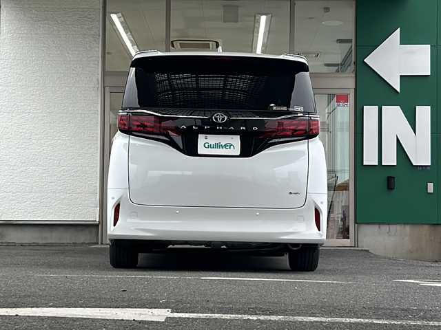 トヨタ アルファードハイブリット Z 愛知県 2024(令6)年 1.4万km プラチナホワイトパールマイカ 禁煙車/法人ワンオーナー/純正メーカーナビ、TV/パノラミックビューモニター/レザーシート/独立サンルーフ/両側パワースライドドア/トヨタチームメイト/自動駐車/ユニバーサルステップ/ヘッドアップディスプレイ/ブラインドスポットモニター/フリップダウンモニター/デジタルインナーミラー/アダプティプクルーズコントロール/レーンキープアシスト/パドルシフト/置くだけ充電/HDMI/前後コーナーセンサー/クリアランスソナー/Bluetooth/Miracast/ステアリングリモコン/ハンドルヒーター/シートヒーター（セカンドシートまで）/エアシート（セカンドシートまで）/パワーシート/メモリーシート/オットマン/後席サンシェード/AUTOHOLD/純正18アルミ/純正フロアマット/ドアバイザー/フォグランプ/LEDヘッドライト/AUTOライト/AUTOハイビーム/ETC/前後ドラレコ/スペアキー/取扱説明書/保証書