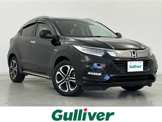 ホンダ ヴェゼル ハイブリッド Z ホンダセンシング 宮城県 2020(令2)年 5.1万km クリスタルブラックパール Honda SENSING	/・衝突軽減ブレーキ	/・アダプティブクルーズコントロール/・車線維持支援システム/・オートハイビーム	/純正7型ナビ/・BT.CD.DVD.SD.USB/フルセグTV/バックカメラ/ドライブレコーダー（F）/ビルトインETC/前席シートヒーター/パドルシフト/横滑り防止装置/アイドリングストップ/LEDヘッドライト/LEDフォグランプ/ステアリングスイッチ/プッシュスタート/スマートキー/純正17inAW/純正フロアマット