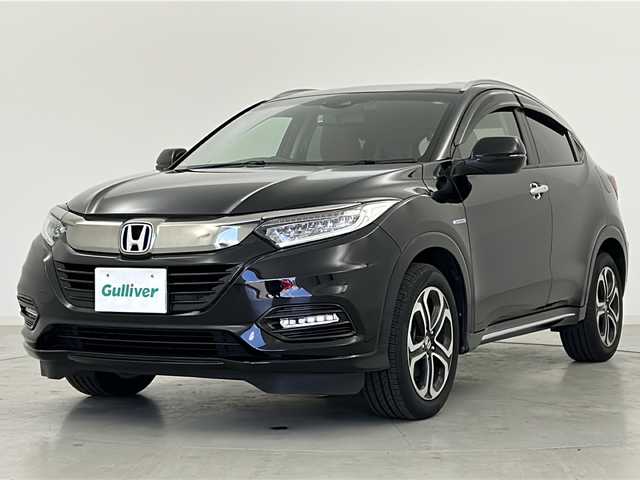 ホンダ ヴェゼル ハイブリッド Z ホンダセンシング 宮城県 2020(令2)年 5.1万km クリスタルブラックパール Honda SENSING	/・衝突軽減ブレーキ	/・アダプティブクルーズコントロール/・車線維持支援システム/・オートハイビーム	/純正7型ナビ/・BT.CD.DVD.SD.USB/フルセグTV/バックカメラ/ドライブレコーダー（F）/ビルトインETC/前席シートヒーター/パドルシフト/横滑り防止装置/アイドリングストップ/LEDヘッドライト/LEDフォグランプ/ステアリングスイッチ/プッシュスタート/スマートキー/純正17inAW/純正フロアマット