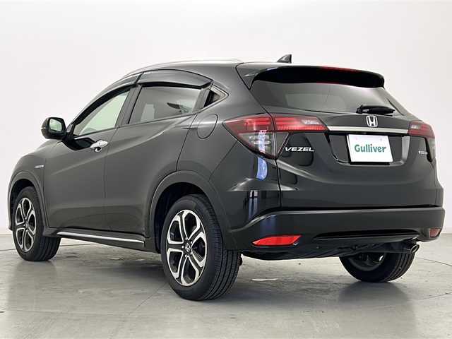 ホンダ ヴェゼル ハイブリッド Z ホンダセンシング 宮城県 2020(令2)年 5.1万km クリスタルブラックパール Honda SENSING	/・衝突軽減ブレーキ	/・アダプティブクルーズコントロール/・車線維持支援システム/・オートハイビーム	/純正7型ナビ/・BT.CD.DVD.SD.USB/フルセグTV/バックカメラ/ドライブレコーダー（F）/ビルトインETC/前席シートヒーター/パドルシフト/横滑り防止装置/アイドリングストップ/LEDヘッドライト/LEDフォグランプ/ステアリングスイッチ/プッシュスタート/スマートキー/純正17inAW/純正フロアマット