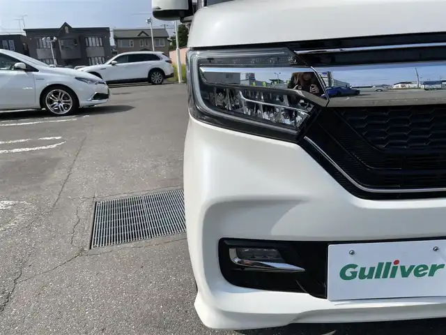 ホンダ Ｎ ＢＯＸ カスタム G L ホンダセンシング 道央・札幌 2018(平30)年 3.4万km プレミアムホワイトパールⅡ ４WD/社外メモリナビ(AM/FM/CD/DVD/BT)/フルセグ(走行中視聴可能)/バックカメラ/ウィンカーミラー/クルーズコントロール/ドアバイザー/プッシュスタート/片側パワースライドドア/ビルトインETC/ベンチシート/前席シートヒーター/横滑り防止装置/レーンキープアシスト/衝突軽減ブレーキ/オートライト/コーナーセンサー/純正フロアマット/片側パワースライドドア/スペアキー×2/エンジンスターター
