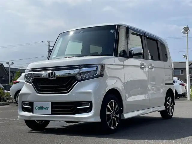 ホンダ Ｎ ＢＯＸ カスタム G L ホンダセンシング 道央・札幌 2018(平30)年 3.4万km プレミアムホワイトパールⅡ ４WD/社外メモリナビ(AM/FM/CD/DVD/BT)/フルセグ(走行中視聴可能)/バックカメラ/ウィンカーミラー/クルーズコントロール/ドアバイザー/プッシュスタート/片側パワースライドドア/ビルトインETC/ベンチシート/前席シートヒーター/横滑り防止装置/レーンキープアシスト/衝突軽減ブレーキ/オートライト/コーナーセンサー/純正フロアマット/片側パワースライドドア/スペアキー×2/エンジンスターター