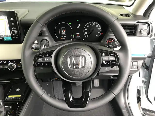 ホンダ ヴェゼル ハイブリッド e:HEV Z PLaYパッケージ 愛知県 2025(令7)年 0.1千km パールⅡ ディスプレイオーディオ　/バックカメラ　/置くだけ充電　/パドルシフト　/追従クルコン　/パワーバックドア　/ＥＴＣ２．０　/ＢＳＭ　/シートヒーター　/ハーフレザー　/タイプＣ　/フルセグＴＶ　/ステアヒーター