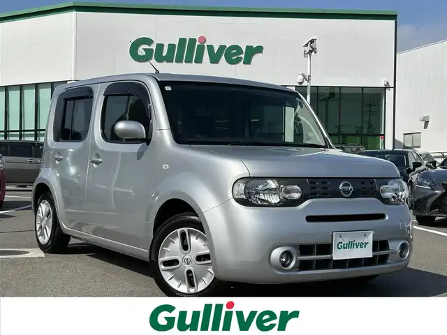 日産 キューブ 15X Vセレクション 愛媛県 2017(平29)年 4万km ブリリアントシルバー 登録時走行距離:39519km/純正フロアマット/ベンチシート/純正FM/AM/AUX/CDプレーヤー/AＡＣ/キセノンヘッドライト/フォグランプ/アイドリングストップ/横滑り防止装置/ABS/パワステ/パワーウィンドウ/エアバッグ/スマートキー/スペアキー