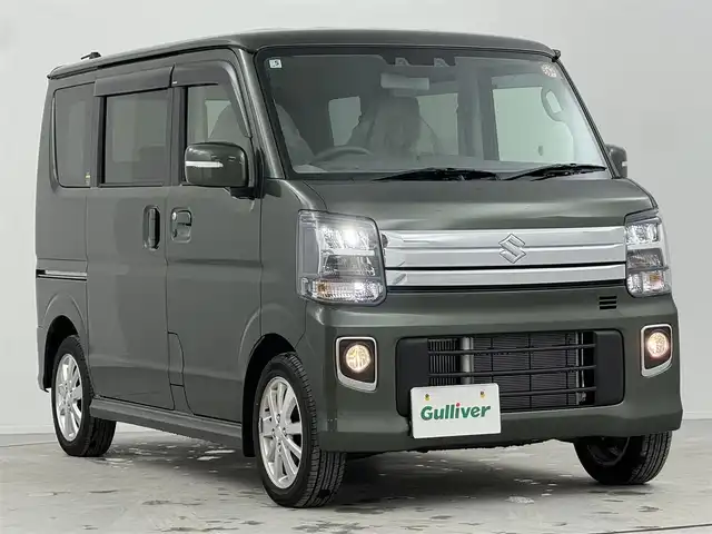 スズキ エブリィ ワゴン PZターボ 熊本県 2025(令7)年 0.3万km クールカーキPM 純正SDナビ/バックカメラ/スズキセーフティサポート/片側パワースライドドア/アイドリングストップ/USB充電ソケット/D席シートヒーター/LEDヘッドライト/オートライト/レベライザー/スマートキー/スペアキー/プッシュスタート