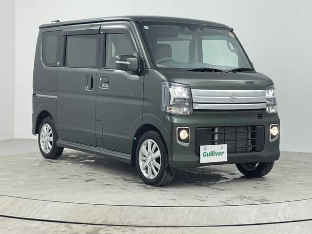 スズキ エブリィ ワゴン PZターボ 熊本県 2025(令7)年 0.3万km クールカーキPM 純正SDナビ/バックカメラ/スズキセーフティサポート/片側パワースライドドア/アイドリングストップ/USB充電ソケット/D席シートヒーター/LEDヘッドライト/オートライト/レベライザー/スマートキー/スペアキー/プッシュスタート