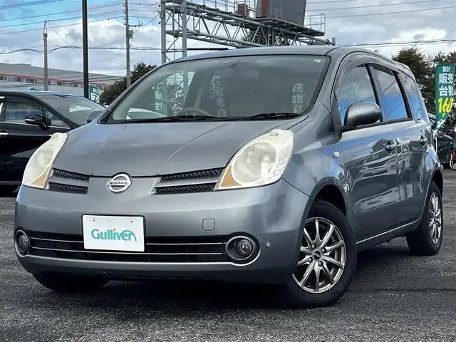 日産 ノート 15E FOUR 道央・札幌 2006(平18)年 14.7万km トワイライトグレー ４WD/社外HDDナビ/AM/FM/CD/ワンセグ/コーナーセンサー/スマートキー/LEDヘッドライト/オートライト/フォグランプ/電動格納ミラー/純正フロアマット/ドアバイザー/社外AW付冬タイヤ積込/175/65/R14/2020年/山5mm