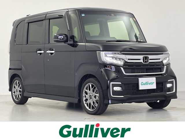 ホンダ Ｎ ＢＯＸ カスタム L ターボ 愛知県 2022(令4)年 1.5万km クリスタルブラックパール 純正7インチナビ/(Bluetooth/iPad/USB/CD/DVD/フルセグ)/テレビキット/バックカメラ/前後純正ドライブレコーダー/ビルトインETC/ホンダセンシング/・衝突被害軽減システム/・アダプティブクルーズコントロール/・車線逸脱抑制アシスト/両側パワースライドドア/シートヒーター/横滑り防止/革巻きステアリング/パドルシフト/電動パーキングブレーキ/シーケンシャルウィンカー/モデューロAW15インチ/スペアキー/LEDライト/保証書/取扱説明書