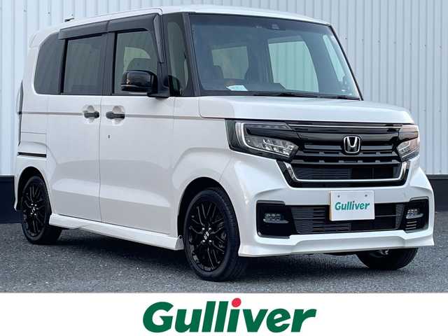 ホンダ Ｎ ＢＯＸ カスタム L ターボ スタイル+ブラック 千葉県 2022(令4)年 3.1万km プラチナホワイトパール 社外メモリナビ/(フルセグTV/BT/CD/DVD/FM/AM)/バックカメラ/衝突被害軽減システム/車線逸脱警報/レーダークルーズコントロール/ハーフレザーシート/両側パワースライドドア/横滑り防止装置/アイドリングストップ/LEDヘッドライト/フォグランプ/オートライト/ウィンカーミラー/電動格納ミラー/純正15インチAW/シートリフター/プッシュスタート/スマートキー/フロアマット/スペアキー/取扱説明書/保証書