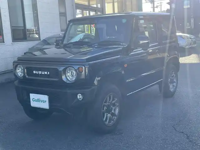 スズキ ジムニー XC 静岡県 2024(令6)年 0.8万km ブルーイッシュブラックパール3 ワンオーナー/背面タイヤハードカバー/衝突軽減ブレーキ/レーンキープアシスト/レーダークルーズコントロール/バックソナー/LEDライト/前席シートヒーター/純正16インチAW/スマートキー×2/保証書/取扱説明書
