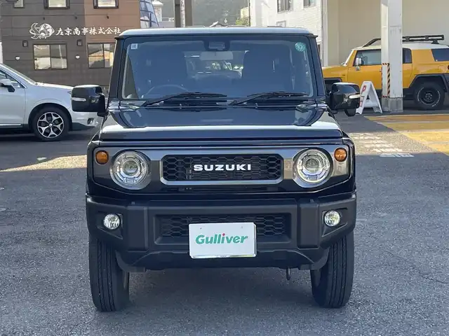 スズキ ジムニー XC 静岡県 2024(令6)年 0.8万km ブルーイッシュブラックパール3 ワンオーナー/背面タイヤハードカバー/衝突軽減ブレーキ/レーンキープアシスト/レーダークルーズコントロール/バックソナー/LEDライト/前席シートヒーター/純正16インチAW/スマートキー×2/保証書/取扱説明書