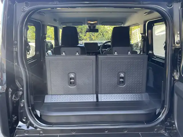 スズキ ジムニー XC 静岡県 2024(令6)年 0.8万km ブルーイッシュブラックパール3 ワンオーナー/背面タイヤハードカバー/衝突軽減ブレーキ/レーンキープアシスト/レーダークルーズコントロール/バックソナー/LEDライト/前席シートヒーター/純正16インチAW/スマートキー×2/保証書/取扱説明書