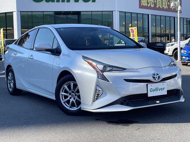 トヨタ プリウス S ツーリングセレクション 長野県 2016(平28)年 11.6万km ホワイトパールクリスタルシャイン 禁煙車/７インチ純正ナビ/Bluetooth Audio/ＴＲＤエアロ/バックカメラ/ビルドインＥＴＣ/シートヒーター（Ｄ＋Ｎ席）/ステアリングスイッチ/革巻きステアリング/純正フロアマット/プッシュスタート/ＬＥＤヘッドライト/オートライト/フォグランプ/電動格納ドアミラー/ウィンカーミラー/ドアバイザー/スマートキー/スペアキー×１/トノカバー/エアコン吹出口ドリンクホルダー/純正アルミホイール(夏タイヤ)積込/横滑り防止機能/盗難防止機能
