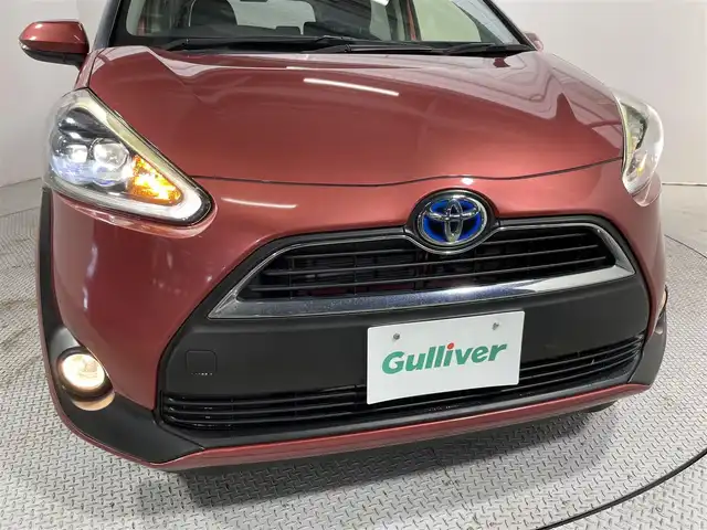 トヨタ シエンタ ハイブリッド G 大阪府 2016(平28)年 7万km レッドマイカM 純正ナビTV 両側パワースライドドア シートヒーター 衝突軽減ブレーキ レーンアシスト オートハイビーム スマートキー プッシュスタート オートライト 前後ドライブレコーダー ETC