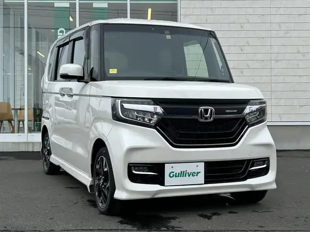 ホンダ Ｎ ＢＯＸ カスタム G L ターボ ホンダセンシング 岩手県 2017(平29)年 7.4万km プレミアムホワイトパールⅡ 4WD/レーダークルーズコントロール/ホンダセンシング/社外ナビ（AVIC-ZH0007）/・AM/FM/CD/DVD/Bluetooth/エンジンスターター付き/フルセグTV/バックカメラ/両側パワースライドドア/横滑り防止装置/レーンキープアシスト/カーテンエアバック/ハーフレザーシート/シートヒーター/ETC/前方ドライブレコーダー/LEDオートライト/オートハイビーム/無限グリルガーニッシュ