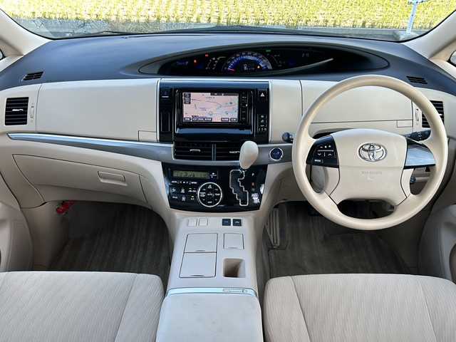 トヨタ エスティマ ハイブリッド X 山形県 2015(平27)年 10.1万km シルバーM 禁煙車/４WD/純正SDナビ/（AM/FM/TV/CD/DVD/SD/BT)/クルーズコントロール/ETC/フロントワイパーデアイサー/AC100V電源/nanoe/バックカメラ/片側パワースライドドア/オットマン/ステアリングスイッチ/ドアバイザー/電動格納ミラー/フォグランプ/純正AW