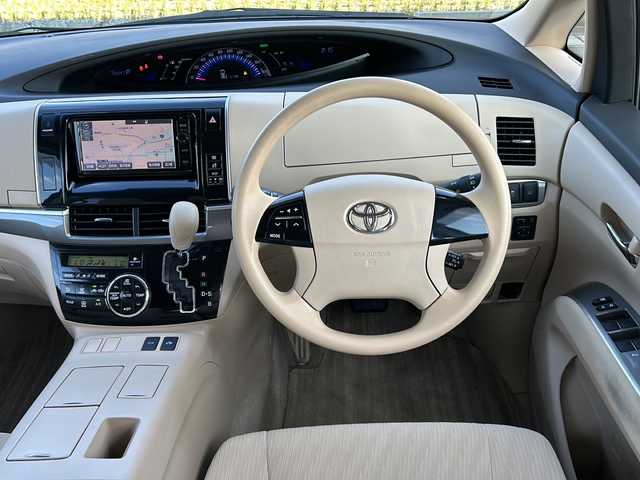 トヨタ エスティマ ハイブリッド X 山形県 2015(平27)年 10.1万km シルバーM 禁煙車/４WD/純正SDナビ/（AM/FM/TV/CD/DVD/SD/BT)/クルーズコントロール/ETC/フロントワイパーデアイサー/AC100V電源/nanoe/バックカメラ/片側パワースライドドア/オットマン/ステアリングスイッチ/ドアバイザー/電動格納ミラー/フォグランプ/純正AW