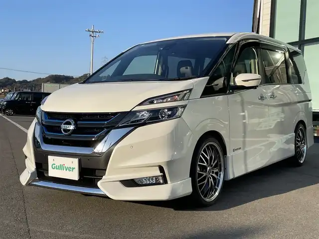 日産 セレナ e－パワー ハイウェイスター V 愛媛県 2018(平30)年 2万km ブリリアントホワイトパール 純正9型ナビ(Bluetooth/フルセグTV)/純正フリップダウンモニター/両側パワースライドドア/全周囲カメラ/純正フルエアロ/プロパイロット/クリアランスソナー/ドライブレコーダー/インテリジェントルームミラー/RS-R車高調/レザー調シートカバー/革巻ステアリング/ステアリングリモコン/ステアリングヒーター/LEDヘッドライト/電動パーキングブレーキ/AutoHold機能/現状サマー(社外AW)(225/35/R19)/タイヤ付純正AW(6部山)/純正サス有