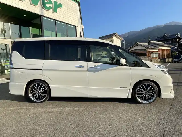 日産 セレナ e－パワー ハイウェイスター V 愛媛県 2018(平30)年 2万km ブリリアントホワイトパール 純正9型ナビ(Bluetooth/フルセグTV)/純正フリップダウンモニター/両側パワースライドドア/全周囲カメラ/純正フルエアロ/プロパイロット/クリアランスソナー/ドライブレコーダー/インテリジェントルームミラー/RS-R車高調/レザー調シートカバー/革巻ステアリング/ステアリングリモコン/ステアリングヒーター/LEDヘッドライト/電動パーキングブレーキ/AutoHold機能/現状サマー(社外AW)(225/35/R19)/タイヤ付純正AW(6部山)/純正サス有
