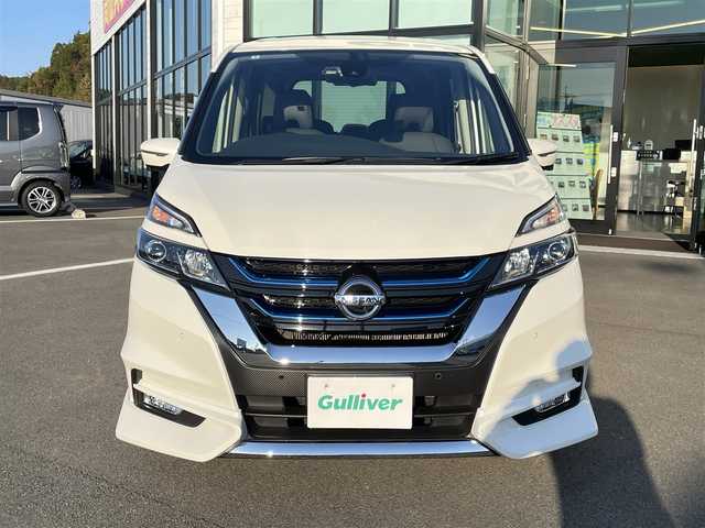 日産 セレナ e－パワー ハイウェイスター V 愛媛県 2018(平30)年 2万km ブリリアントホワイトパール 純正9型ナビ(Bluetooth/フルセグTV)/純正フリップダウンモニター/両側パワースライドドア/全周囲カメラ/純正フルエアロ/プロパイロット/クリアランスソナー/ドライブレコーダー/インテリジェントルームミラー/RS-R車高調/レザー調シートカバー/革巻ステアリング/ステアリングリモコン/ステアリングヒーター/LEDヘッドライト/電動パーキングブレーキ/AutoHold機能/現状サマー(社外AW)(225/35/R19)/タイヤ付純正AW(6部山)/純正サス有