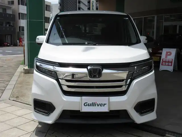 ホンダ ステップワゴン スパーダ ハイブリッド G EX ホンダセンシング 大阪府 2018(平30)年 1.6万km パール ワンオーナー/純正１０インチインターナビ、フルセグＴＶ、/ＣＤ、ＤＶＤ、Ｂｌｕｅｔｏｏｔｈ、ＨＤＭＩ/純正前後カメラドライブレコーダー/両側パワースライドドア/マルチビューカメラ/ホンダセンシング/ＥＴＣ/わくわくゲート/プッシュスタート/スマートキー２個/ＬＥＤヘッドライト/ステアリングスイッチ/ハーフレザー調シート/純正１６インチアルミホイール