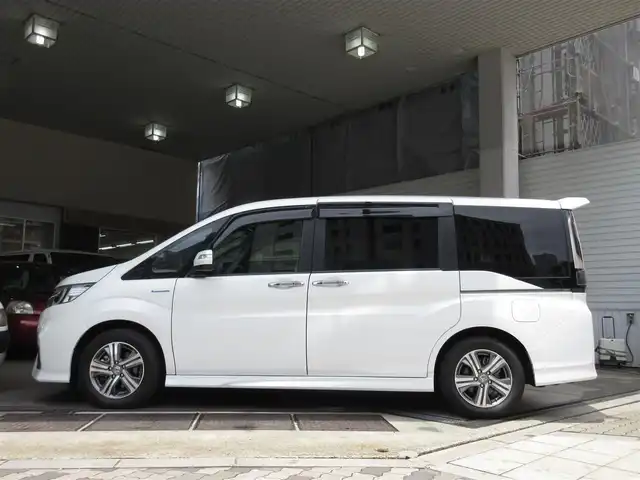 ホンダ ステップワゴン スパーダ ハイブリッド G EX ホンダセンシング 大阪府 2018(平30)年 1.6万km パール ワンオーナー/純正１０インチインターナビ、フルセグＴＶ、/ＣＤ、ＤＶＤ、Ｂｌｕｅｔｏｏｔｈ、ＨＤＭＩ/純正前後カメラドライブレコーダー/両側パワースライドドア/マルチビューカメラ/ホンダセンシング/ＥＴＣ/わくわくゲート/プッシュスタート/スマートキー２個/ＬＥＤヘッドライト/ステアリングスイッチ/ハーフレザー調シート/純正１６インチアルミホイール