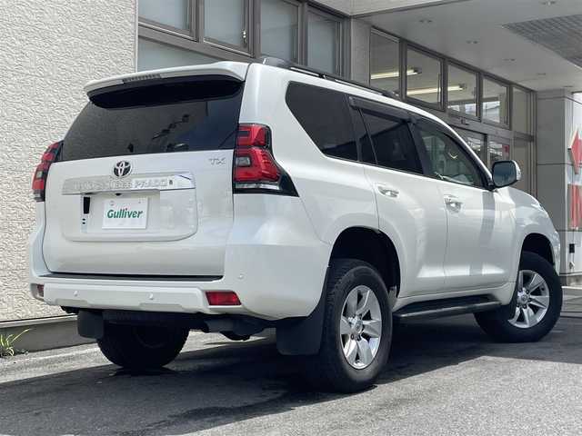 トヨタ ランドクルーザー プラド TX 大阪府 2021(令3)年 3.6万km ホワイトパールクリスタルシャイン ワンオーナー/サンルーフ/社外SDナビ/（フルセグ/BT/CD/DVD）/バックカメラ/レーダークルーズコントロール/レーンキープアシスト/衝突軽減防止システム/純正１７インチAW/ETC/保証書/取扱説明書/スペアキー　有