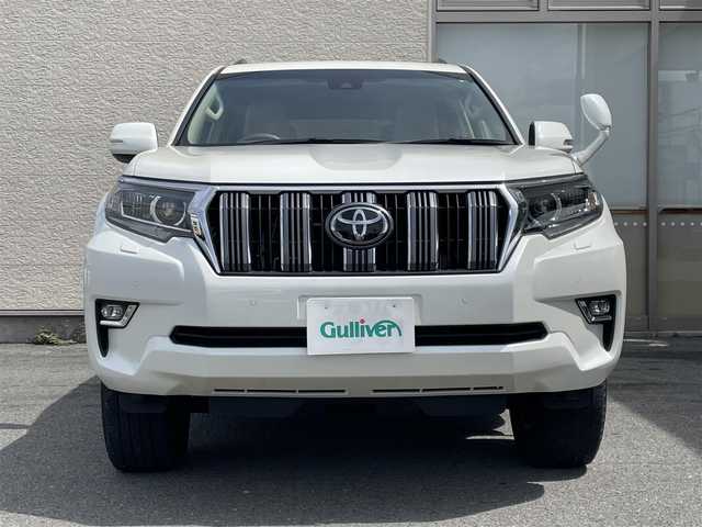 トヨタ ランドクルーザー プラド TX 大阪府 2021(令3)年 3.6万km ホワイトパールクリスタルシャイン ワンオーナー/サンルーフ/社外SDナビ/（フルセグ/BT/CD/DVD）/バックカメラ/レーダークルーズコントロール/レーンキープアシスト/衝突軽減防止システム/純正１７インチAW/ETC/保証書/取扱説明書/スペアキー　有