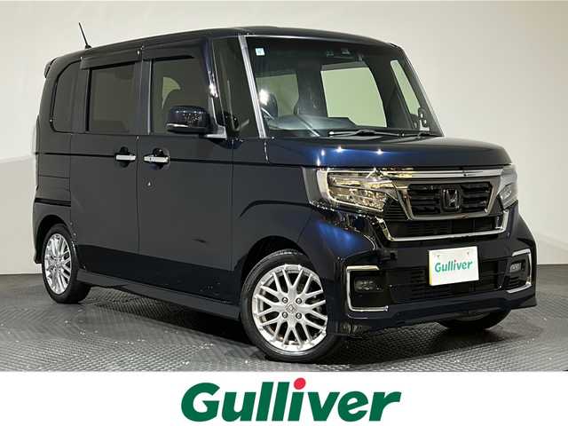 ホンダ Ｎ ＢＯＸ カスタム L ターボ 愛媛県 2021(令3)年 2.6万km ミッドナイトブルービームM ・純正８インチナビ/（フルセグＴＶ・ＢＴ・ＣＤ・ＤＶＤ・ＦＭ・ＡＭ・ＵＳＢ・ａｐｐｌｅｃａｒｐｌａｙ）/・バックカメラ　/・前後ドラレコ　/・ＥＴＣ　/・衝突軽減ブレーキ　/・レーンキープアシスト　/・レーダークルーズコントロール/・両側電動ドア/・オートマチックハイビーム/・前後コーナーセンサー/・DN席シートヒーター