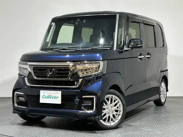 ホンダ Ｎ ＢＯＸ カスタム L ターボ 愛媛県 2021(令3)年 2.6万km ミッドナイトブルービームM ・純正８インチナビ/（フルセグＴＶ・ＢＴ・ＣＤ・ＤＶＤ・ＦＭ・ＡＭ・ＵＳＢ・ａｐｐｌｅｃａｒｐｌａｙ）/・バックカメラ　/・前後ドラレコ　/・ＥＴＣ　/・衝突軽減ブレーキ　/・レーンキープアシスト　/・レーダークルーズコントロール/・両側電動ドア/・オートマチックハイビーム/・前後コーナーセンサー/・DN席シートヒーター