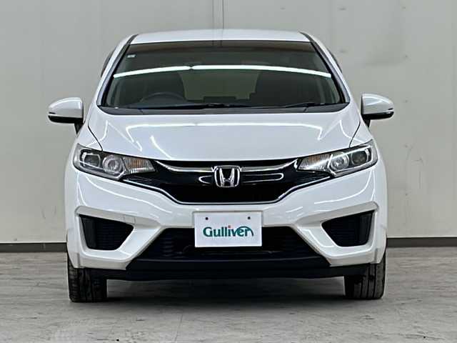 ホンダ フィット ハイブリット Fパッケージ コンフォートED 道央・札幌 2017(平29)年 14.2万km プレミアムホワイトパールⅡ 社外ディスプレイオーディオ//4WD//バックカメラ//アイドリングストップ//ドアバイザー//プッシュスタート//ETC//シートヒータ//エンジンスターター//オートライト