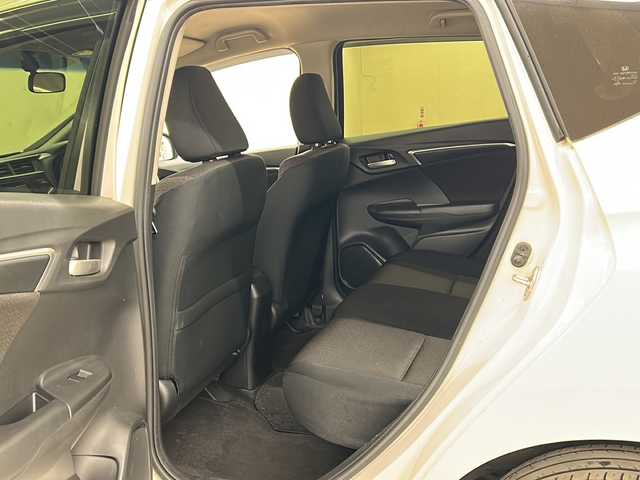 ホンダ フィット ハイブリット Fパッケージ コンフォートED 道央・札幌 2017(平29)年 14.2万km プレミアムホワイトパールⅡ 社外ディスプレイオーディオ//4WD//バックカメラ//アイドリングストップ//ドアバイザー//プッシュスタート//ETC//シートヒータ//エンジンスターター//オートライト