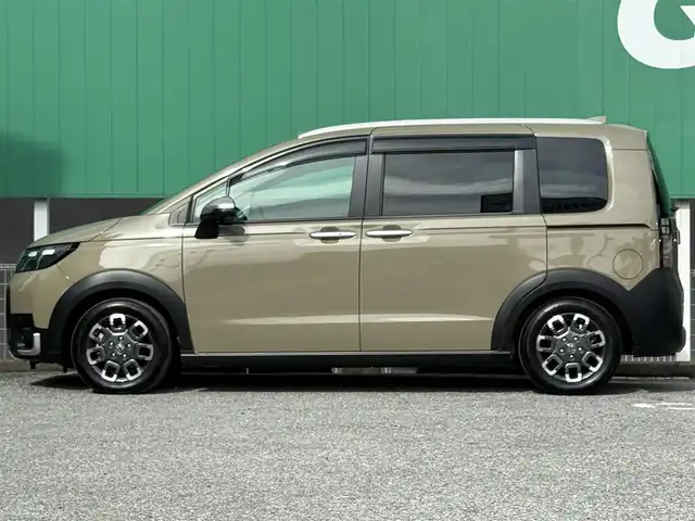 ホンダ フリード ハイブリット e:HEV クロスター 千葉県 2025(令7)年 1.7万km ベージュ 純正9インチメモリーナビ/フルセグTV/USB/Bluetooth/ワンオーナー/両側パワースライドドア/レーダークルーズコントロール/前後ドライブレコーダー/ホンダセンシング/ETC/ブラインドスポットモニター/シートヒーター/オートライト/LEDヘッドライト/フォグランプ/スマートキー/プッシュスタート/純正15インチAW