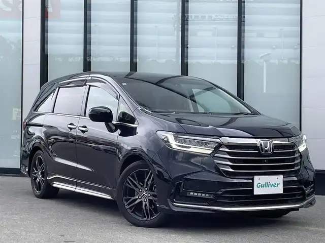 ホンダ オデッセイ ハイブリッド e:HEVアブソルート EX 大阪府 2021(令3)年 3.7万km プレミアムヴィーナスブラックP ホンダセンシング/両側パワースライドドア/純正10インチナビ/Bluetooth/HDMI/CD/DVD/フルセグTV/USB/フリップダウンモニター/マルチビューカメラシステム/ブラインドスポットモニター/パーキングセンサーシステム/前後ドライブレコーダー/純正デジタルインナーミラー/ビルトインETC/パワーバックドア/オットマン/DN席シートヒーター/DN席パワーシート/純正フロアマット/取扱説明書/保証書