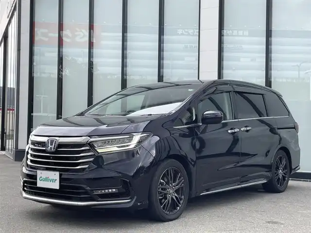 ホンダ オデッセイ ハイブリッド e:HEVアブソルート EX 大阪府 2021(令3)年 3.7万km プレミアムヴィーナスブラックP ホンダセンシング/両側パワースライドドア/純正10インチナビ/Bluetooth/HDMI/CD/DVD/フルセグTV/USB/フリップダウンモニター/マルチビューカメラシステム/ブラインドスポットモニター/パーキングセンサーシステム/前後ドライブレコーダー/純正デジタルインナーミラー/ビルトインETC/パワーバックドア/オットマン/DN席シートヒーター/DN席パワーシート/純正フロアマット/取扱説明書/保証書