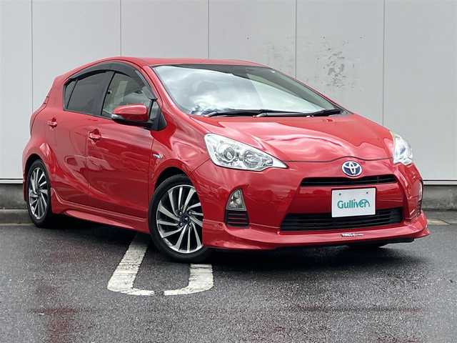 トヨタ アクア S 三重県 2014(平26)年 11万km スーパーレッドⅤ モデリスタ16インチアルミホイール/エアロ(F/S/R)/ダウンサス/純正ナビ(Bluetooth/CD/AM/FM/TV)/ETC/純正マット/ドアバイザー/スペアキー