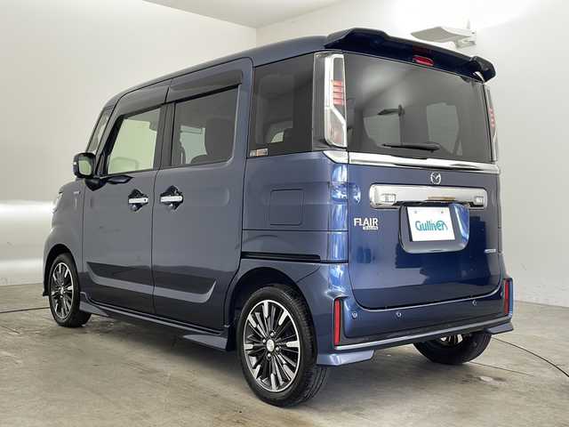 マツダ フレアワゴン カスタムスタイル ハイブリッド XS 兵庫県 2023(令5)年 1.3万km 紺Ｍ ・社外ナビ（TV・DVD・USB・CD・BT）/・アラウンドビューモニター/・両側パワースライドドア/・レーンキープアシスト/・プリクラッシュセーフティ/・レーダークルーズコントロール/・LEDオートライト/・フォグランプ/・オートマチックハイビーム/・ヘッドアップディスプレイ/・ウインカーミラー/・電動格納ミラー/・ドアバイザー/・横滑り防止装置/・クリアランスソナー/・レザー調シート（ハーフ）/・USB充電ポート/・運転席シートヒーター/・革巻きステアリング/・ステアリングリモコン/・オートエアコン/・アイドリングストップ/・純正フロアマット/・純正15インチアルミホイール/・プッシュスタート/・スマートキー/・盗難防止装置/・保証書/・取扱説明書